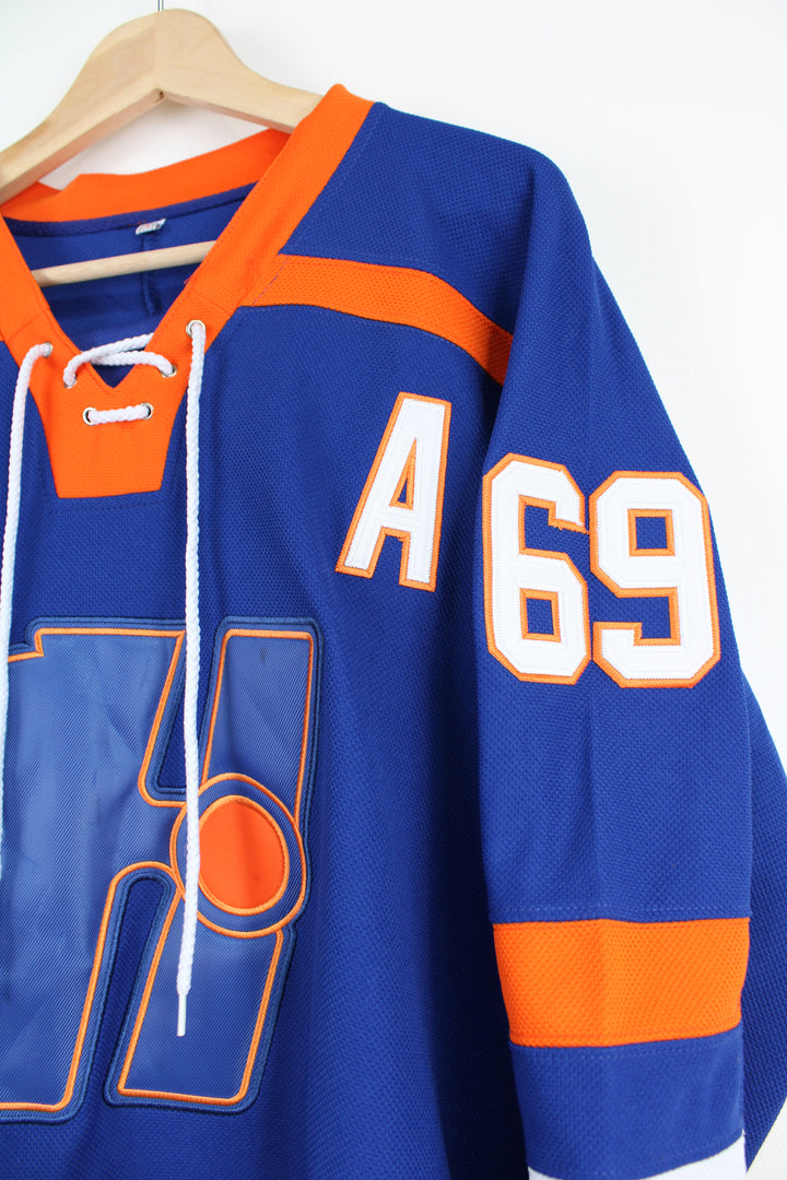 Blue and orange #69 Doug Glatt Halifax Highlanders NHL jersey, with embroidered lettering and badges.