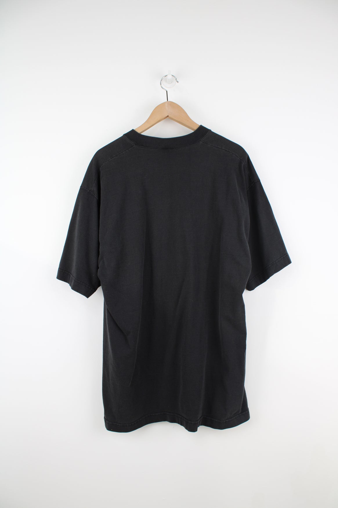 Faded black oversized 100% cotton t-shirt by Wilson, features spell-out graphic across the chest