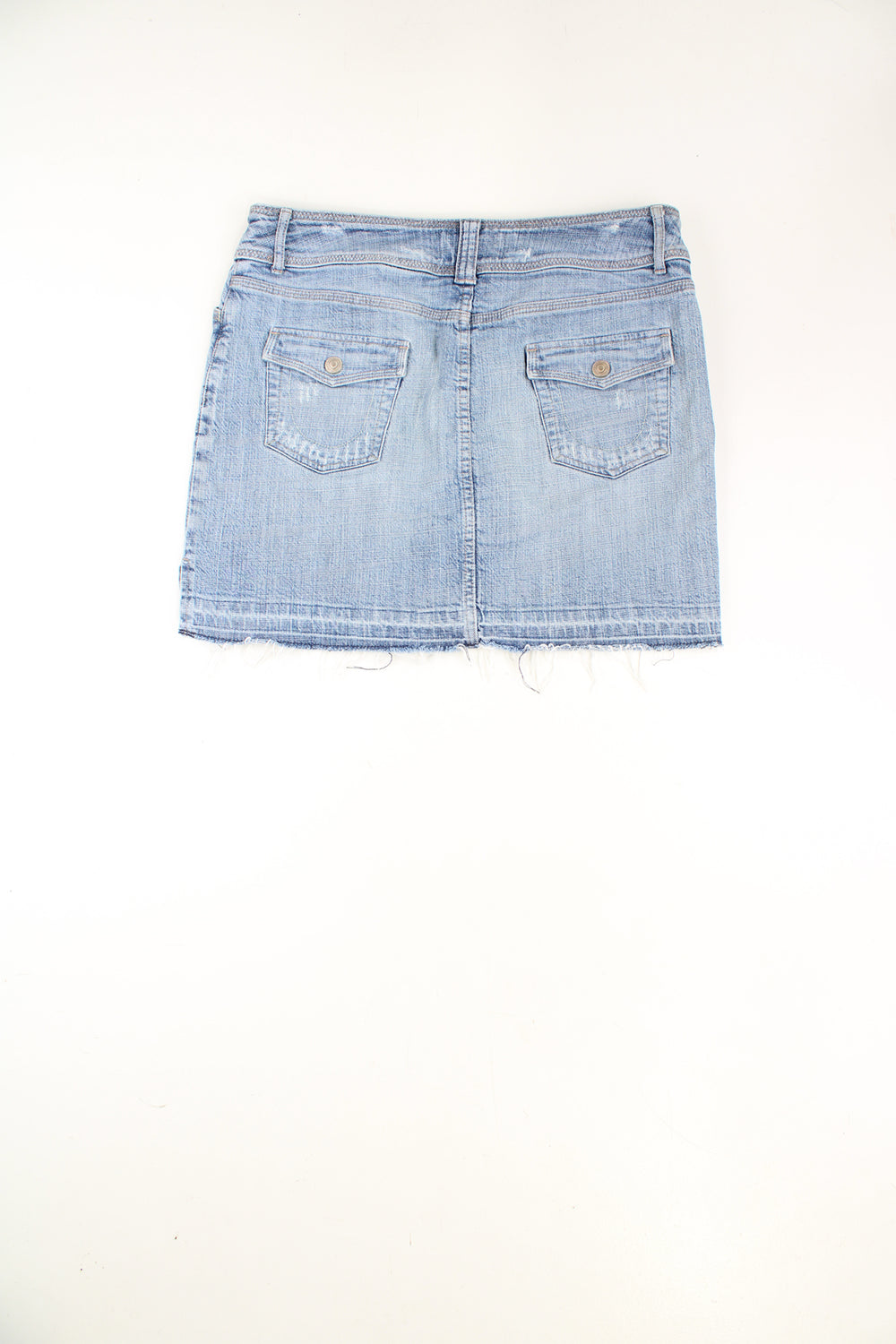 Y2K blue denim mini skirt made by Next. Low rise fit with distressed detail. good condition - zip on the pocket is missing its pull but still functional. Size in Label: Womens 14