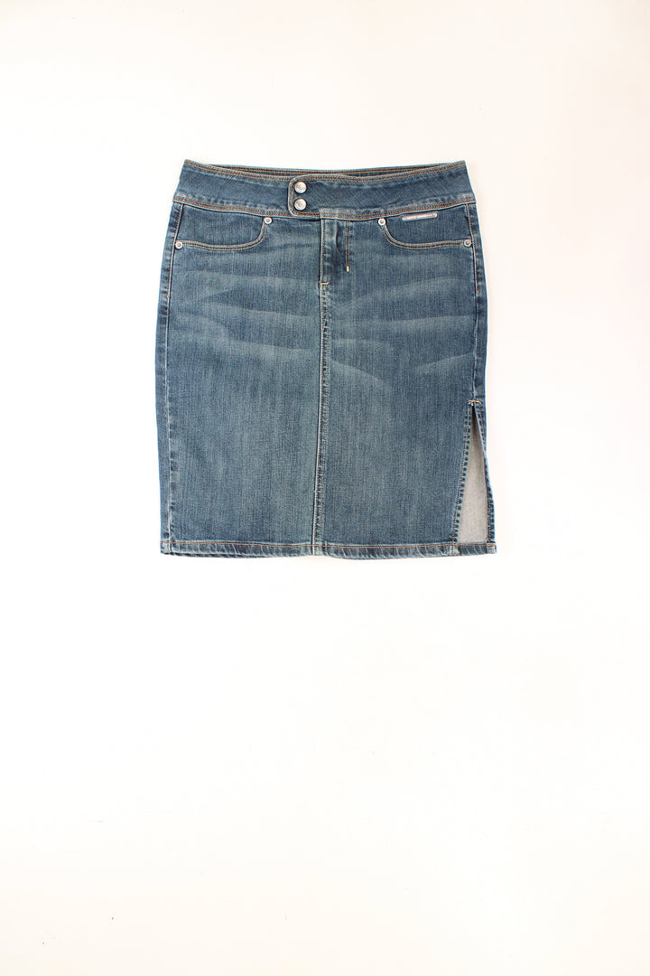 Levi's stone wash blue denim skirt. Could be worn mid or low rise depending on measurements.  good condition Size in Label: No Size - Measures like a size 10 (M)