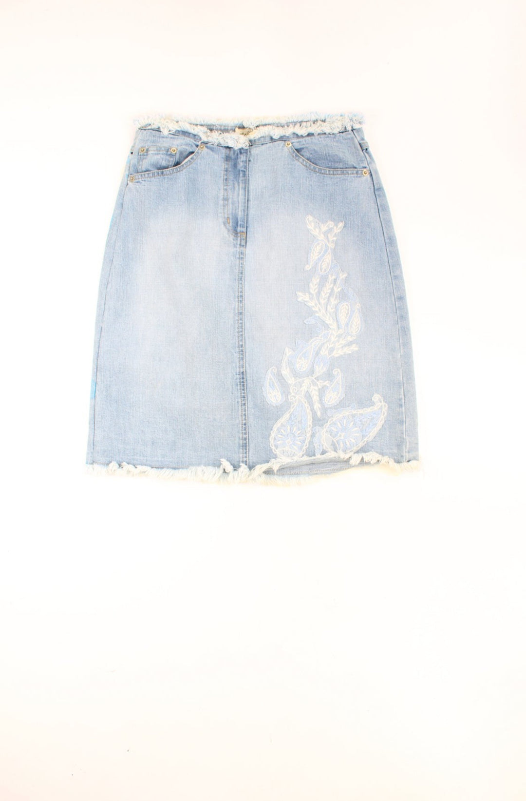 Y2K light wash blue denim skirt. Could be worn mid or low rise depending on measurements. Features applique embroidered detail on the front and distressed hem. waistband.  good condition. Size in Label: Womens 10 