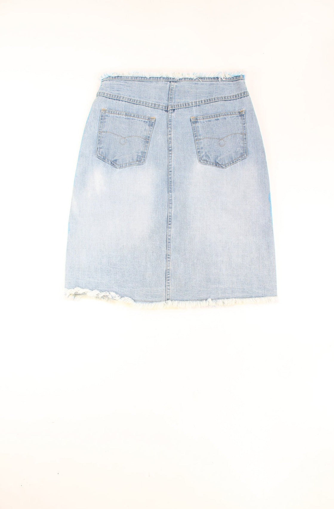 Y2K light wash blue denim skirt. Could be worn mid or low rise depending on measurements. Features applique embroidered detail on the front and distressed hem. waistband.  good condition. Size in Label: Womens 10 