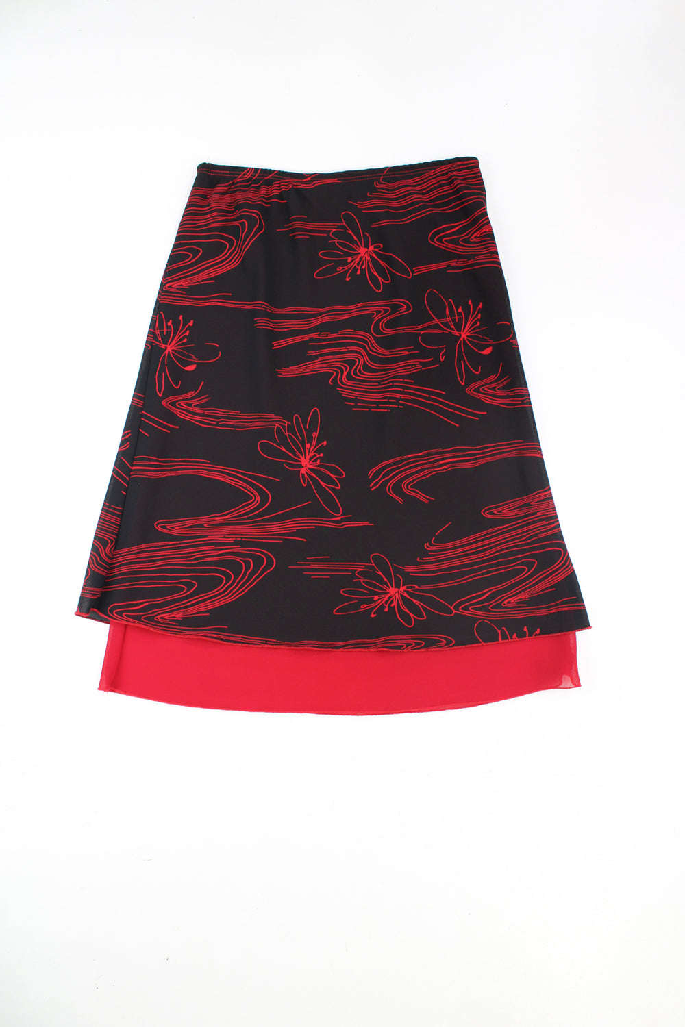 Y2K stretchy midi skirt in black and red pattern with red tie at the front. good condition Size in Label: Womens M - can stretch to fit multiple sizes