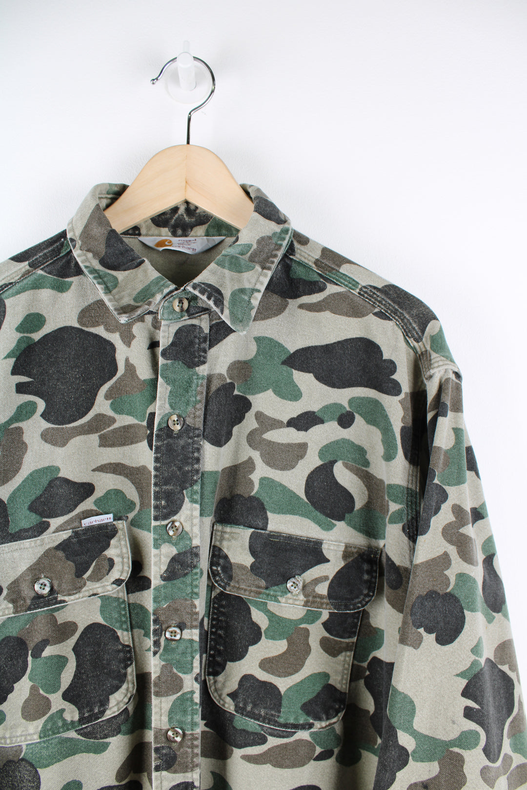 Vintage Carhartt camo workwear shirt, button up with double chest pockets, and embroidered logo on the front.