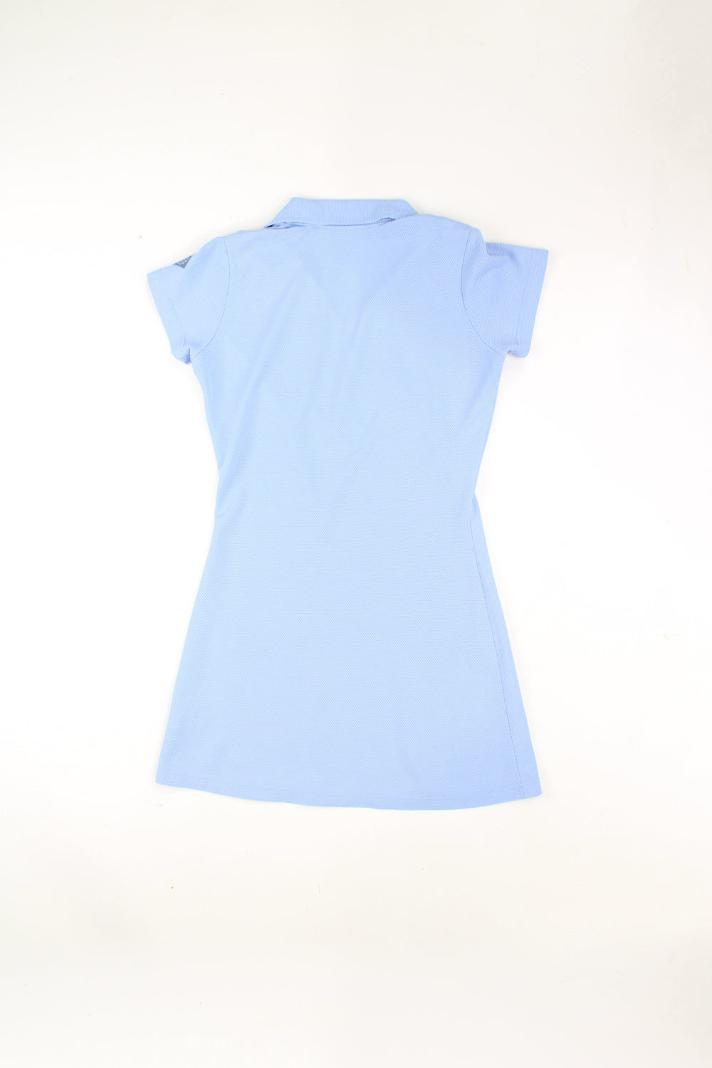 Y2K Reebok tennis dress in baby blue, made from stretchy waffled style material with polo shirt collar detailing and embroidered logo on the chest 