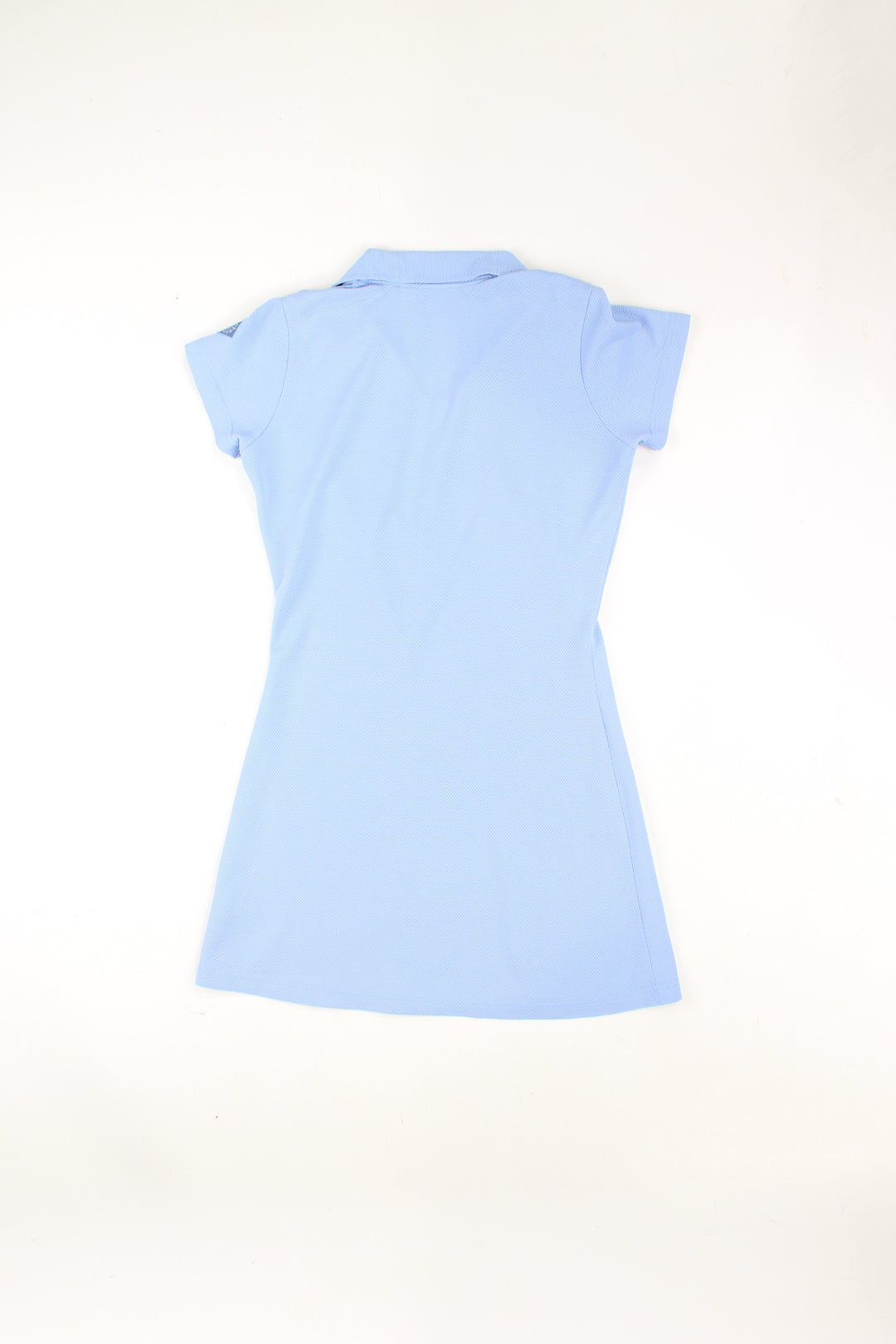 Y2K Reebok tennis dress in baby blue, made from stretchy waffled style material with polo shirt collar detailing and embroidered logo on the chest 