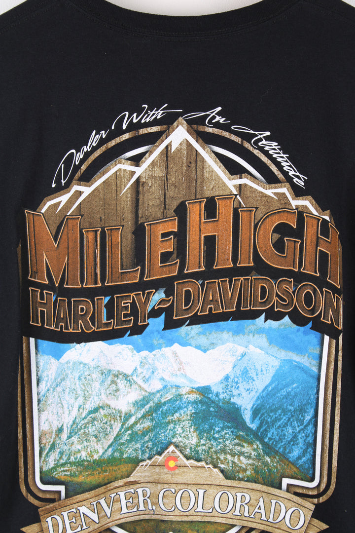 Vintage Harley Davidson Motorcycles Denver, Colorado T-shirt in black, chest pocket on the front with printed logo on it, and has a big Colorado graphic design printed on the back.