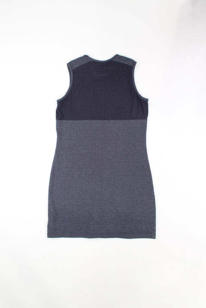 Y2K Reebok grey and black tennis dress made from stretch cotton, features embroidered logo on the chest 