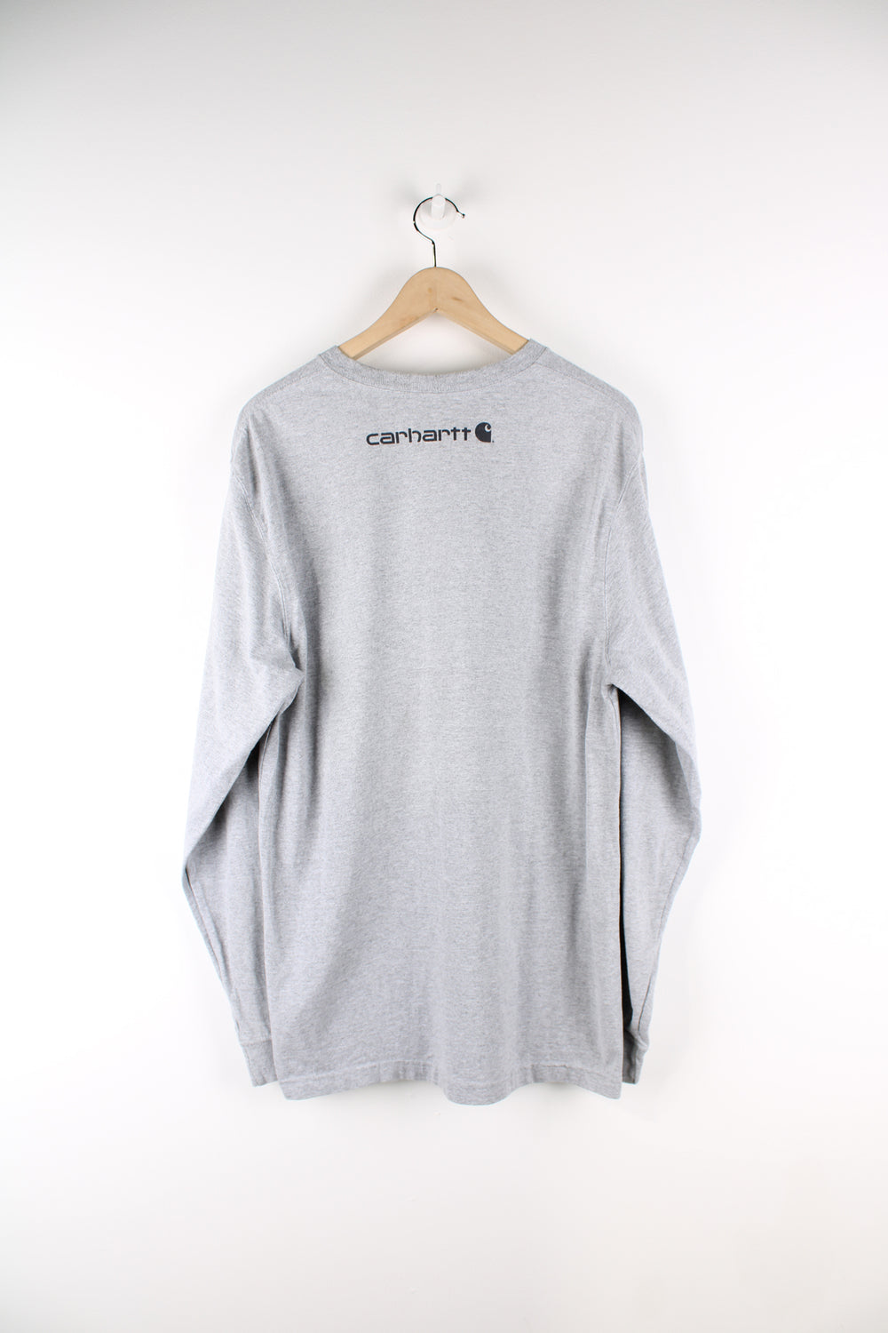 Vintage Carhartt long sleeve T-shirt in grey, plain but has Carhartt logo going down the left sleeve, as well as on the back. 