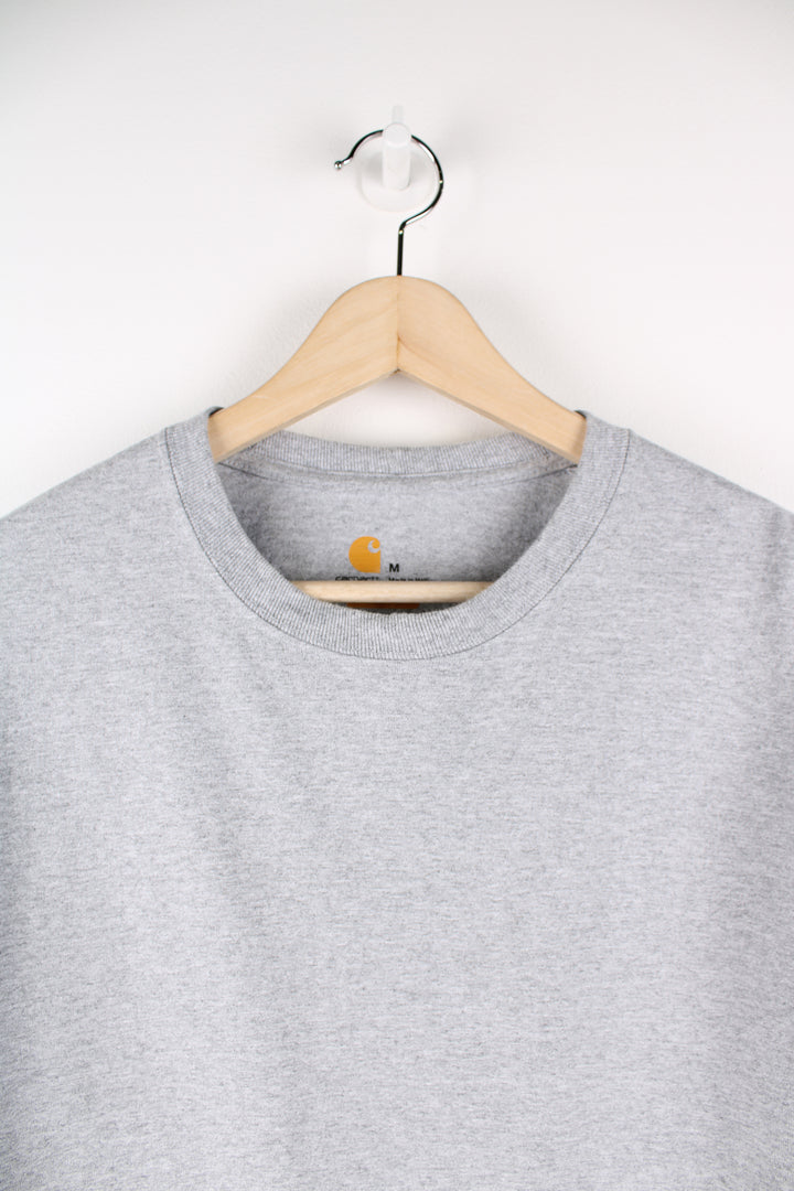 Vintage Carhartt long sleeve T-shirt in grey, plain but has Carhartt logo going down the left sleeve, as well as on the back. 