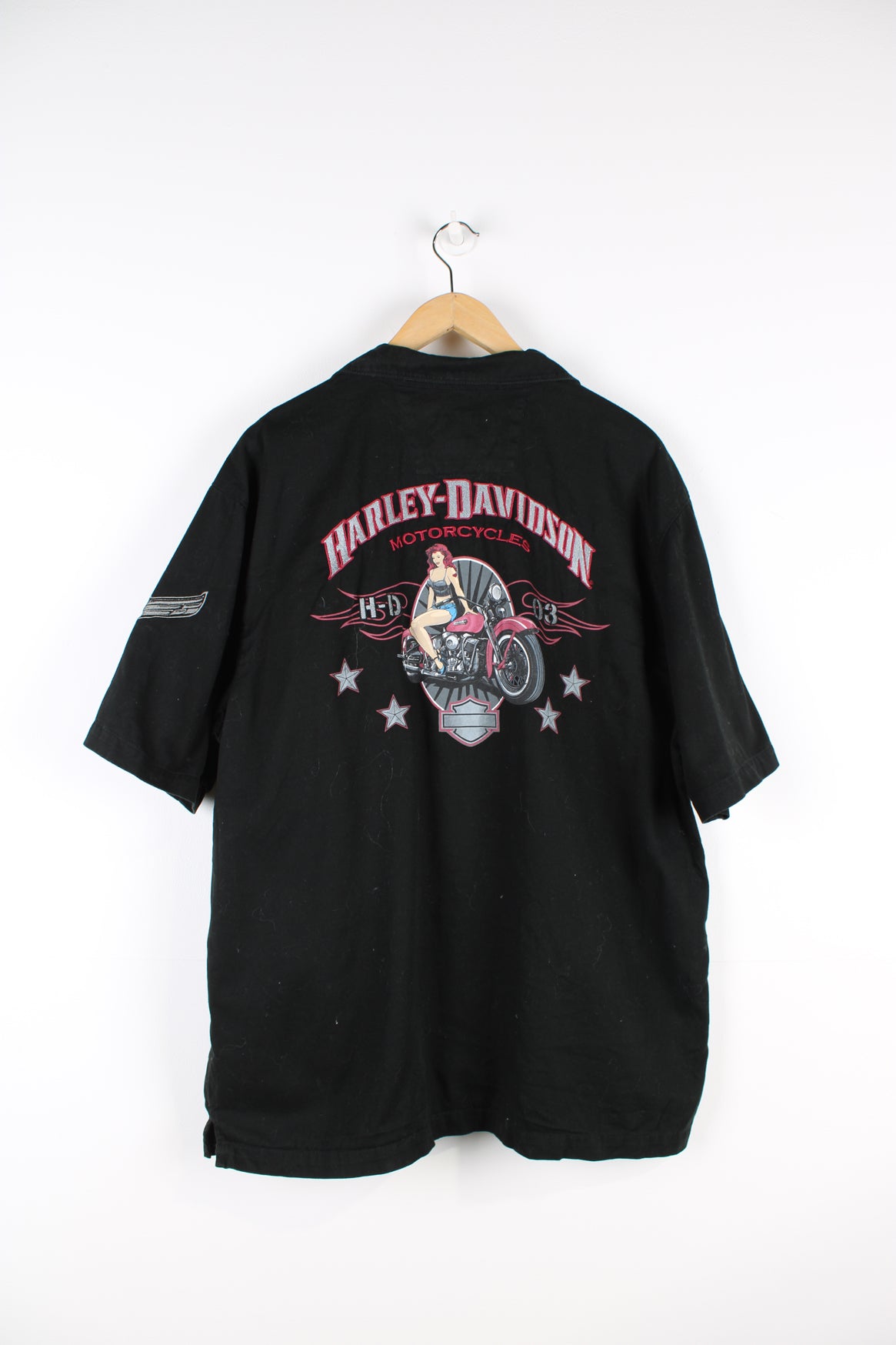 Vintage Harley Davidson Motorcycles short sleeve shirt in black, button up with a camp collar, double chest pockets, V-Twin Power embroidered on the front, and logo embroidered on the back. 