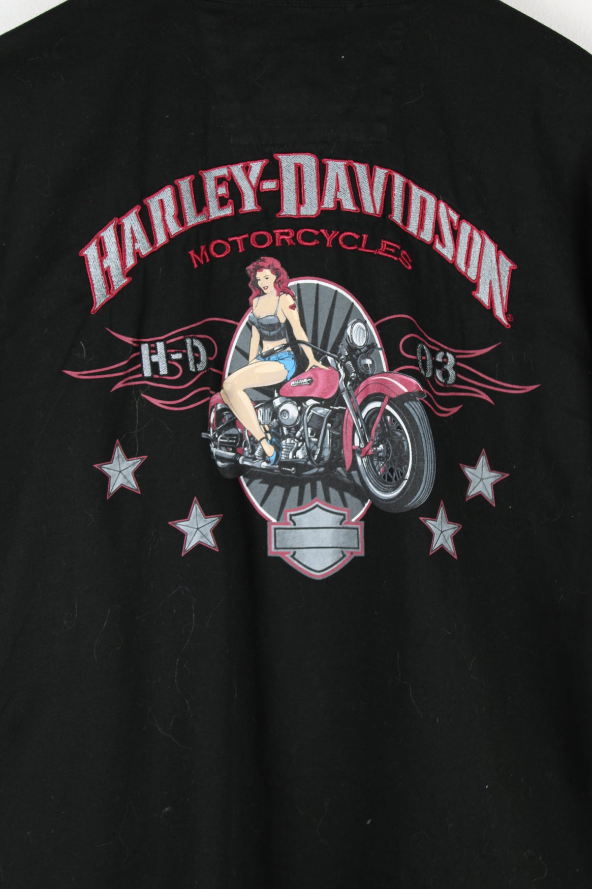 Vintage Harley Davidson Motorcycles short sleeve shirt in black, button up with a camp collar, double chest pockets, V-Twin Power embroidered on the front, and logo embroidered on the back. 