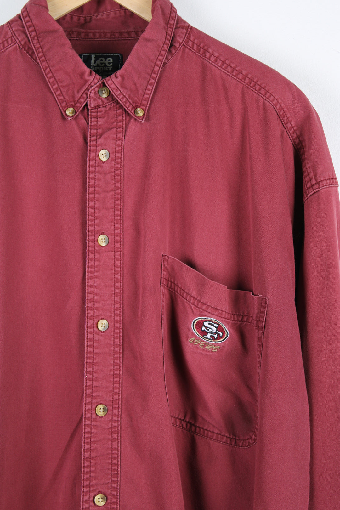 Vintage San Francisco 49ers maroon red cotton shirt by Lee Sport, features embroidered logo on the chest pocket