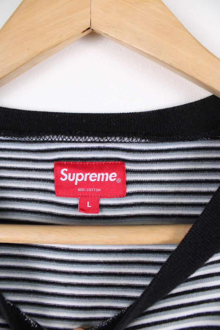 Supreme black, white and grey striped t-shirt, features embroidered spell-out on the chest