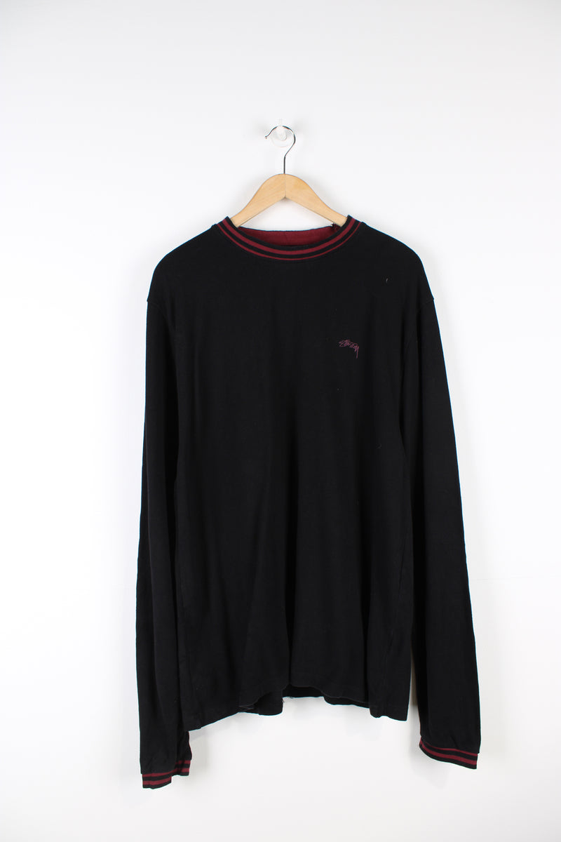 Stussy long sleeve t-shirt, features embroidered logo on the chest and maroon elasticated cuffs and collar