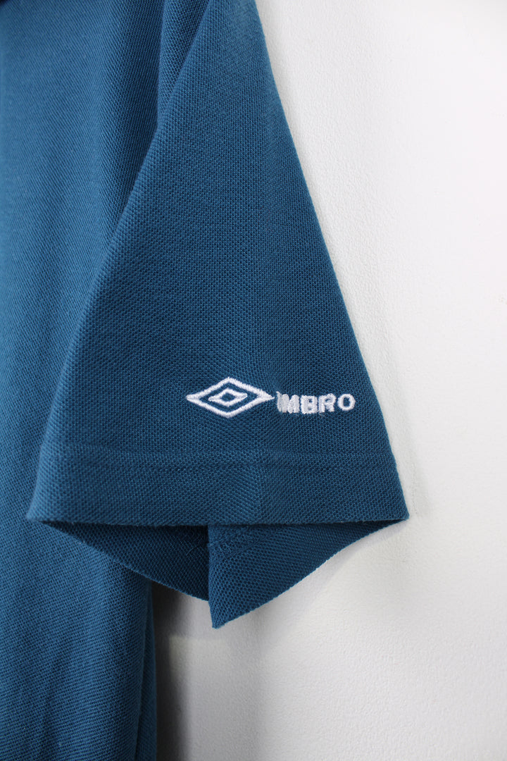 Vintage blue Umbro polo shirt with embroudered logo on the chest. good condition Size in Label: Mens S