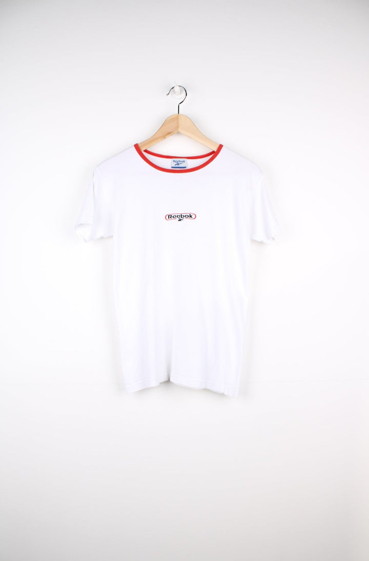 Y2K white Reebok fitted t-shirt with embroidered logo on the chest and red piping around the neck. good condition Size in Label: Womens M