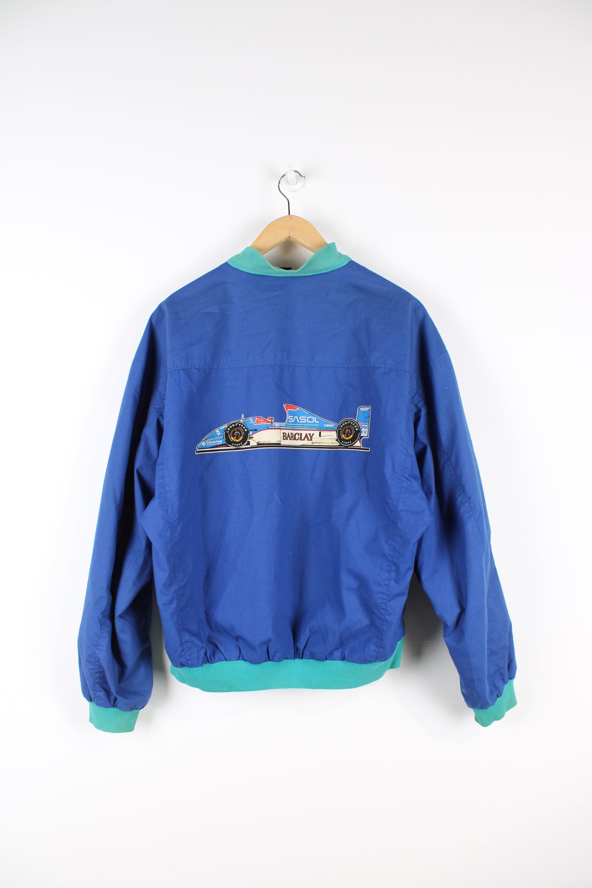 Rare vintage 1992 Sasol Jordan Yamaha blue cotton, zip through  racing jacket features F1 car Jordan 192 on the back