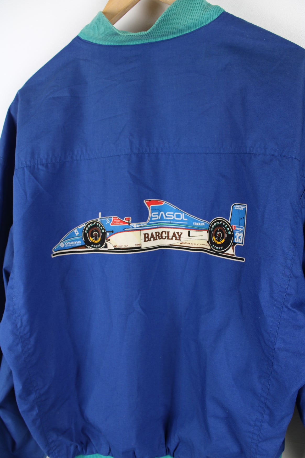 Rare vintage 1992 Sasol Jordan Yamaha blue cotton, zip through  racing jacket features F1 car Jordan 192 on the back