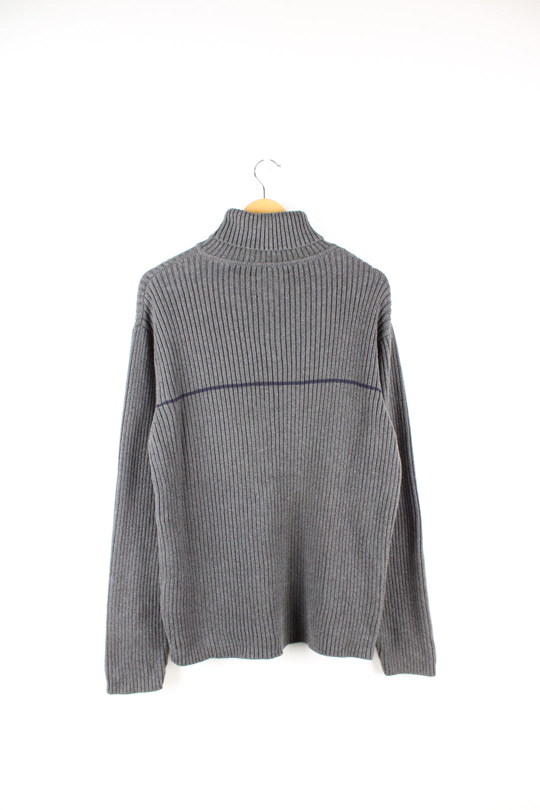 Tommy Hilfiger grey rib knit roll neck jumper. Features a horizontal darker grey stripe across the chest and embroidered logo on the hem. Made from a 100% cotton. good condition  Size in Label:  XL - Measures like a Mens M