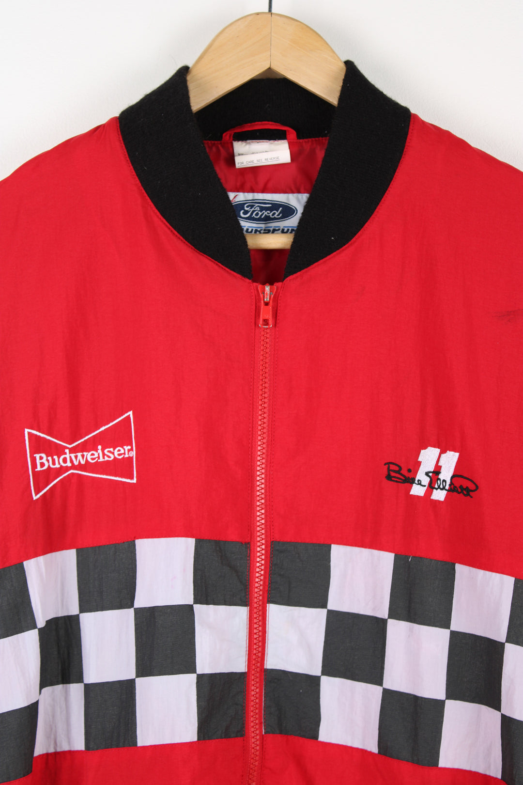 Vintage Budweiser x Bill Elliott red zip through, shell style racing jacket. Features embroidered badges/logos on the chest and checker board wrap around design 