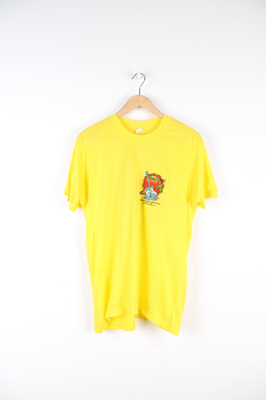 Vintage 1985 yellow Beach Boys convention t-shirt. Single stitch with design on the front and back. good condition  Size in Label:  Slim fit XL