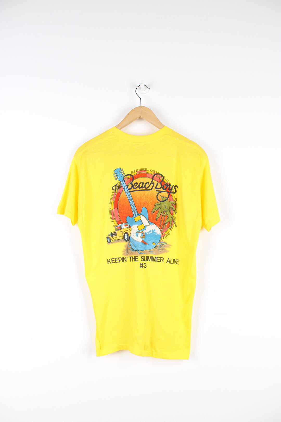 Vintage 1985 yellow Beach Boys convention t-shirt. Single stitch with design on the front and back. good condition  Size in Label:  Slim fit XL