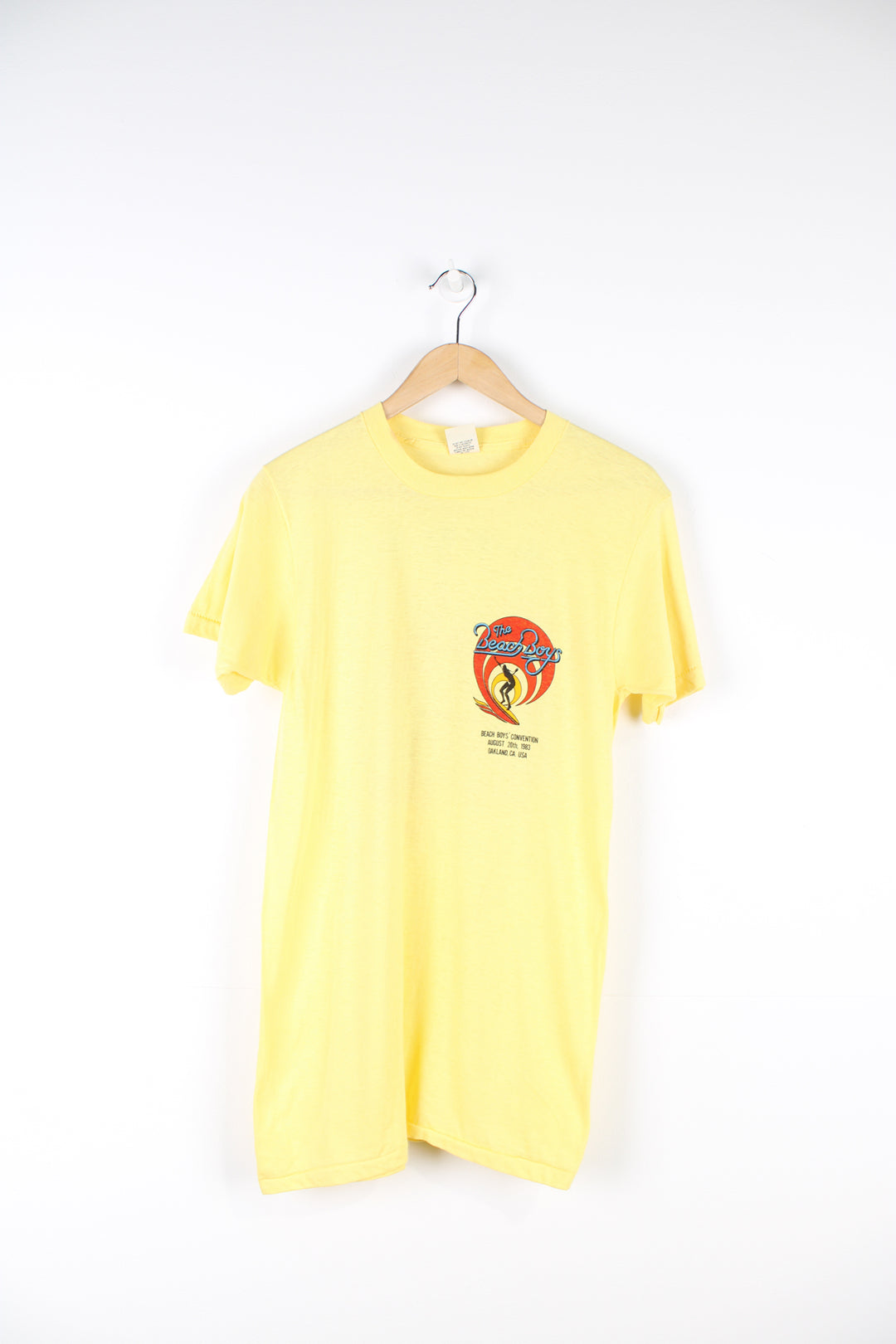 Vintage 1983 yellow Beach Boys convention t-shirt. Single stitch with design on the front and back.  good condition  Size in Label:  Slim fit M