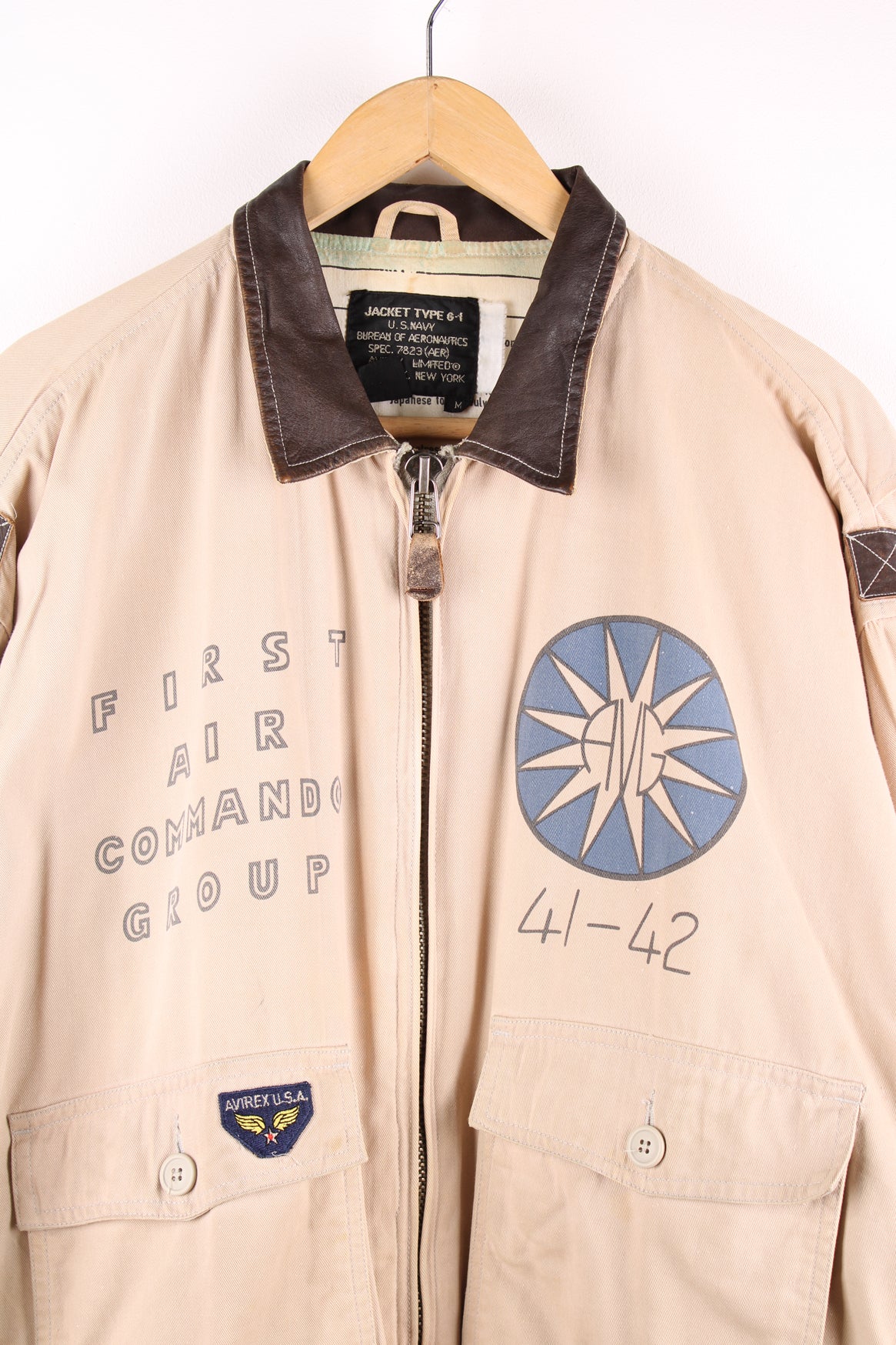 Vintage Avirex type G-1 tan cotton flight jacket with all over printed details and embroidered badge on the pocket