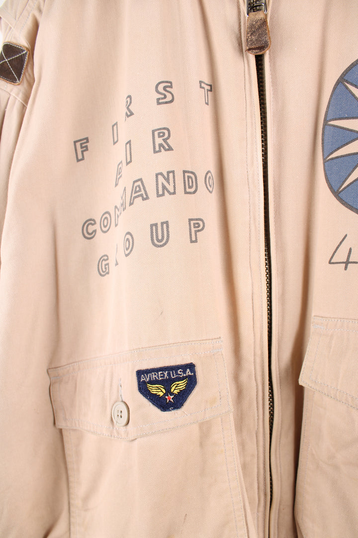 Vintage Avirex type G-1 tan cotton flight jacket with all over printed details and embroidered badge on the pocket