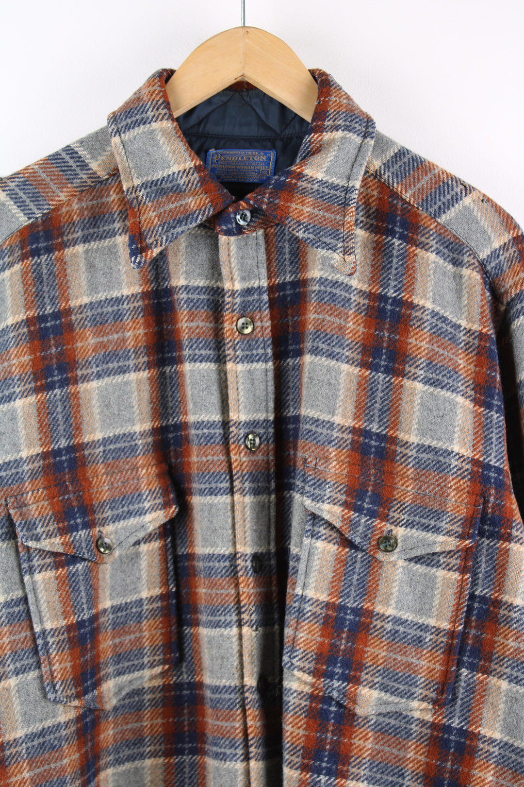 Vintage Pendleton grey, brown and blue pure wool plaid shirt, features quilted lining and chest pocket