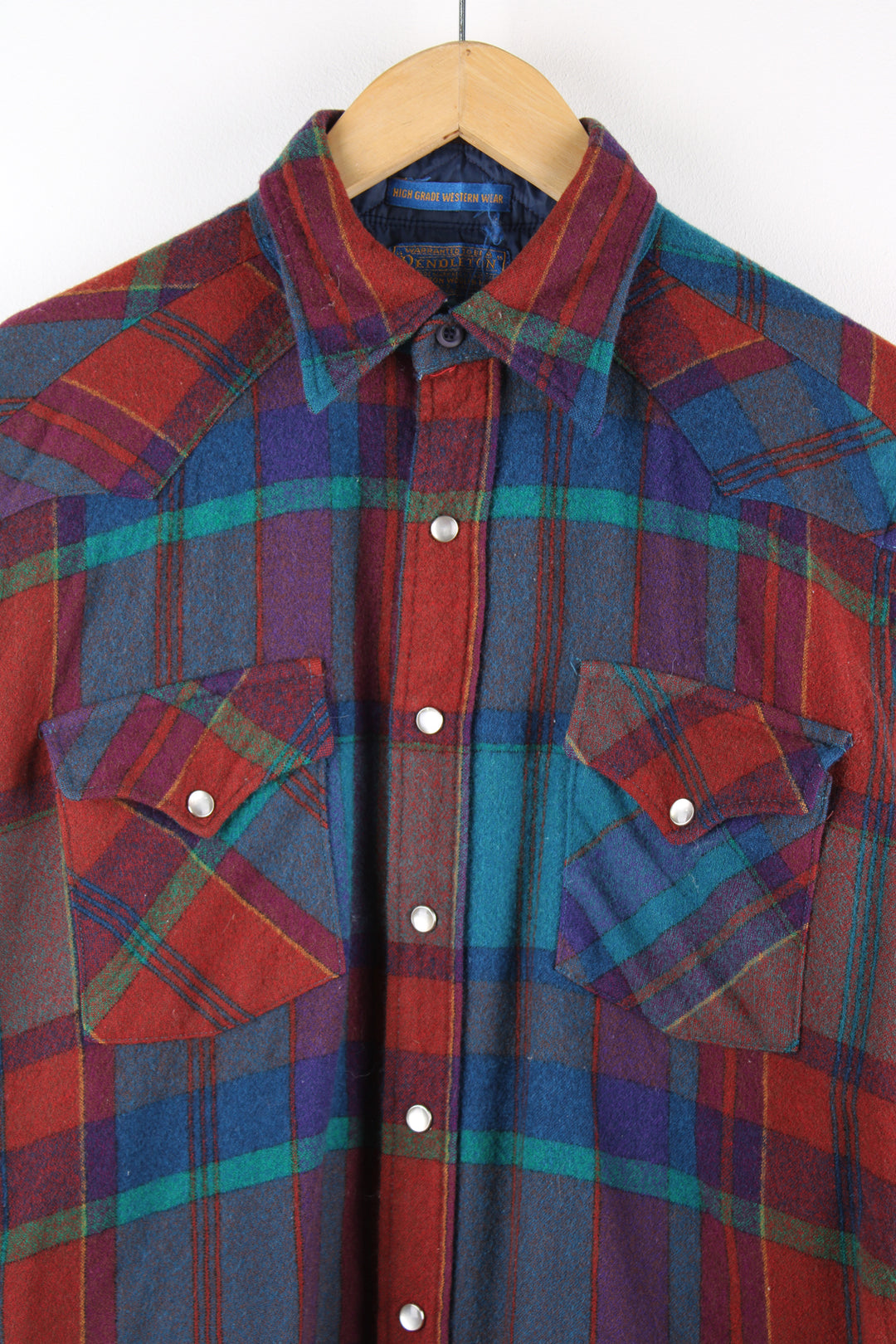 Vintage Pendleton high grade Western wear, plaid wool shirt, features pearl snap buttons