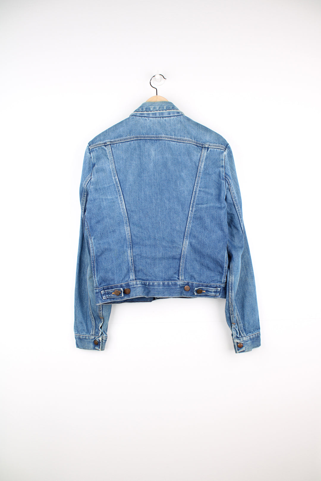 Vintage 70's  Wrangler 'no fault' 100% cotton denim jacket in blue with signature 'W' embroidered on the pockets and logo embroidered on the chest.  