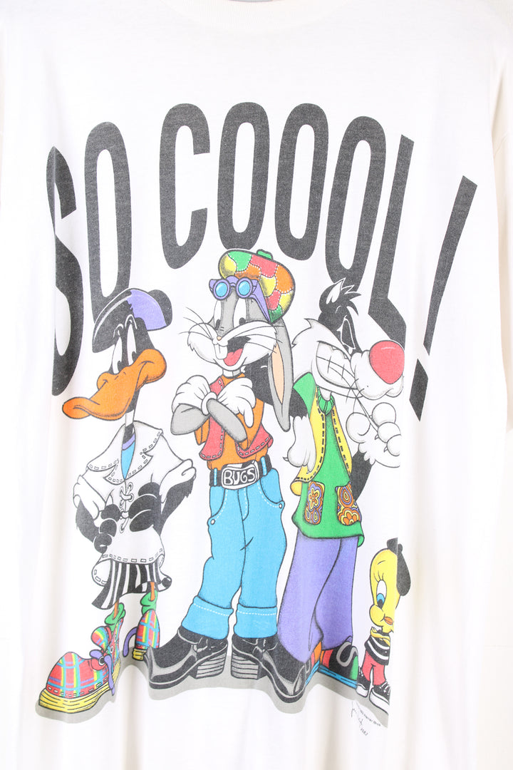 Vintage 1993 Looney Tunes single stitch t-shirt with Colorado graphic on the front. Made by Jerry Leigh.   good condition - some slight discoloration to the neck Size in Label:  Mens L