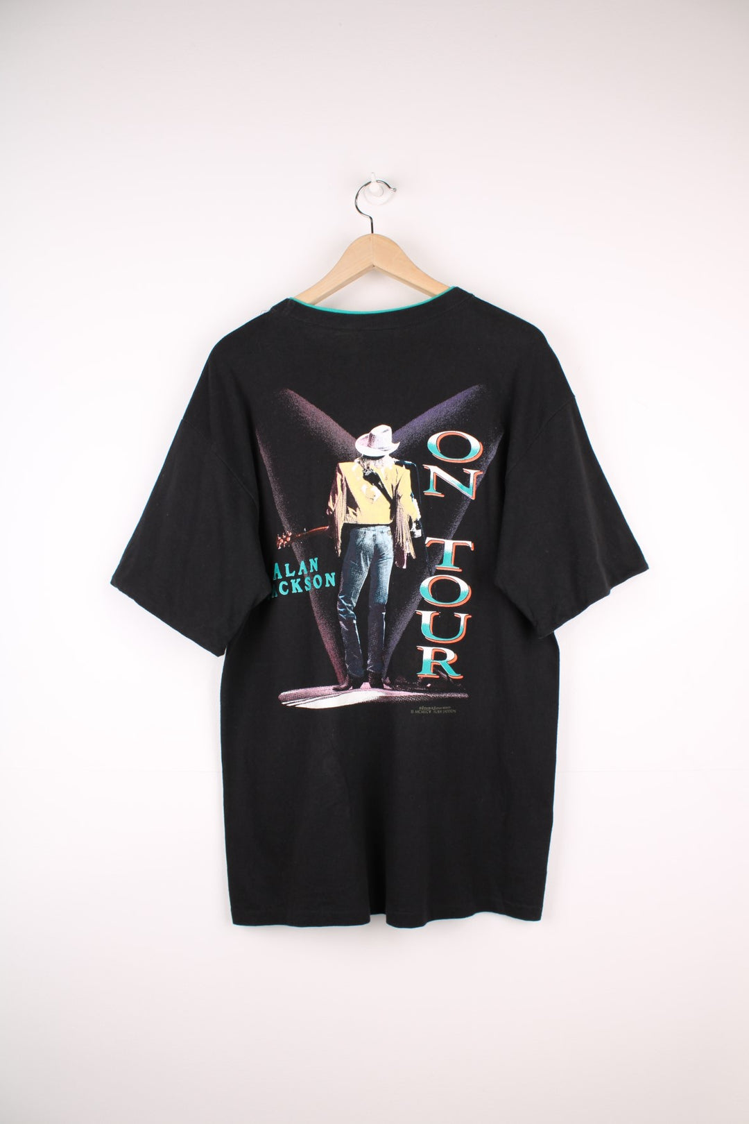 Vintage 90's Alan Jackson On Tour T-Shirt in a black colourway with his name and picture printed on the front and back. 