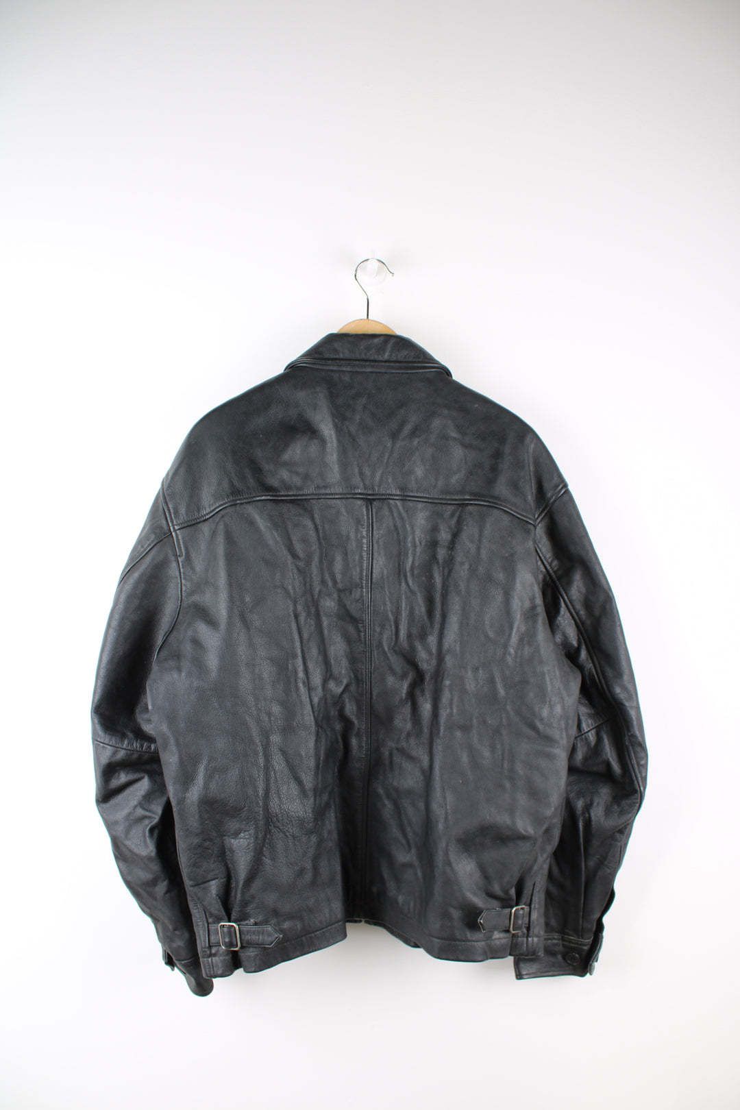 Vintage GAP all black zip through jacket, made from 100% leather. Features buckle details on the hips