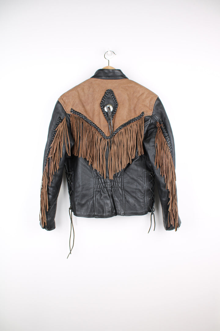 Vintage 80's black and brown fringe motorcycle leather jacket. Features a cropped fit,  fringe detailing on the sleeves and across the back of the shoulder 