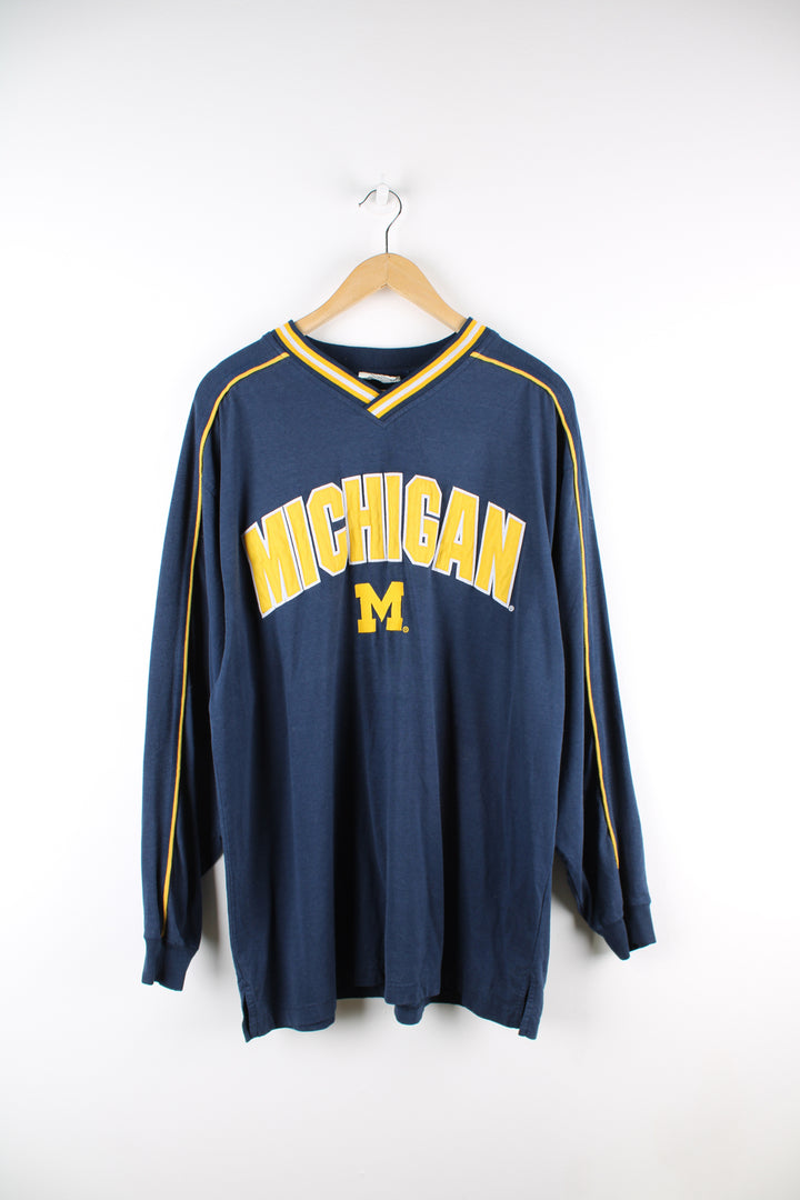 Vintage Lee Sport, Michigan University long sleeve t-shirt, blue and yellow team colourway, v neck with embroidered spell out and logo on the front. 