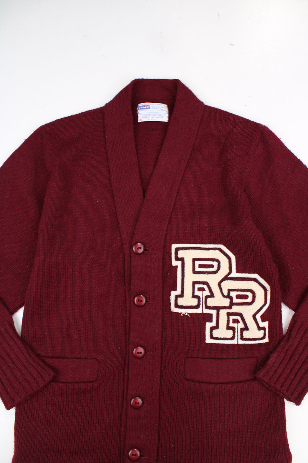 Vintage AMF Tennessee American 1970's maroon red acrylic wool varsity/letterman cardigan, features embroidered badges