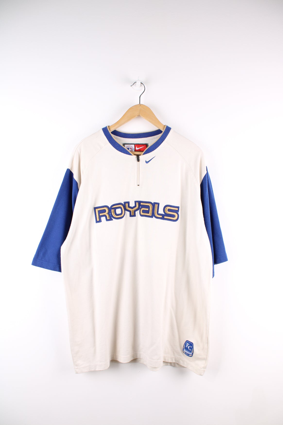 Vintage MLB Kansas City Royals, Nike training top, quarter zip up and quarter length sleeves, has embroidered logos and spell out on the front.