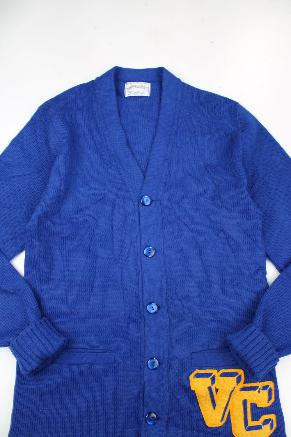 Vintage Bristol BPC Products 100% acrylic wool blue varsity/letterman cardigan, features embroidered badge and pockets