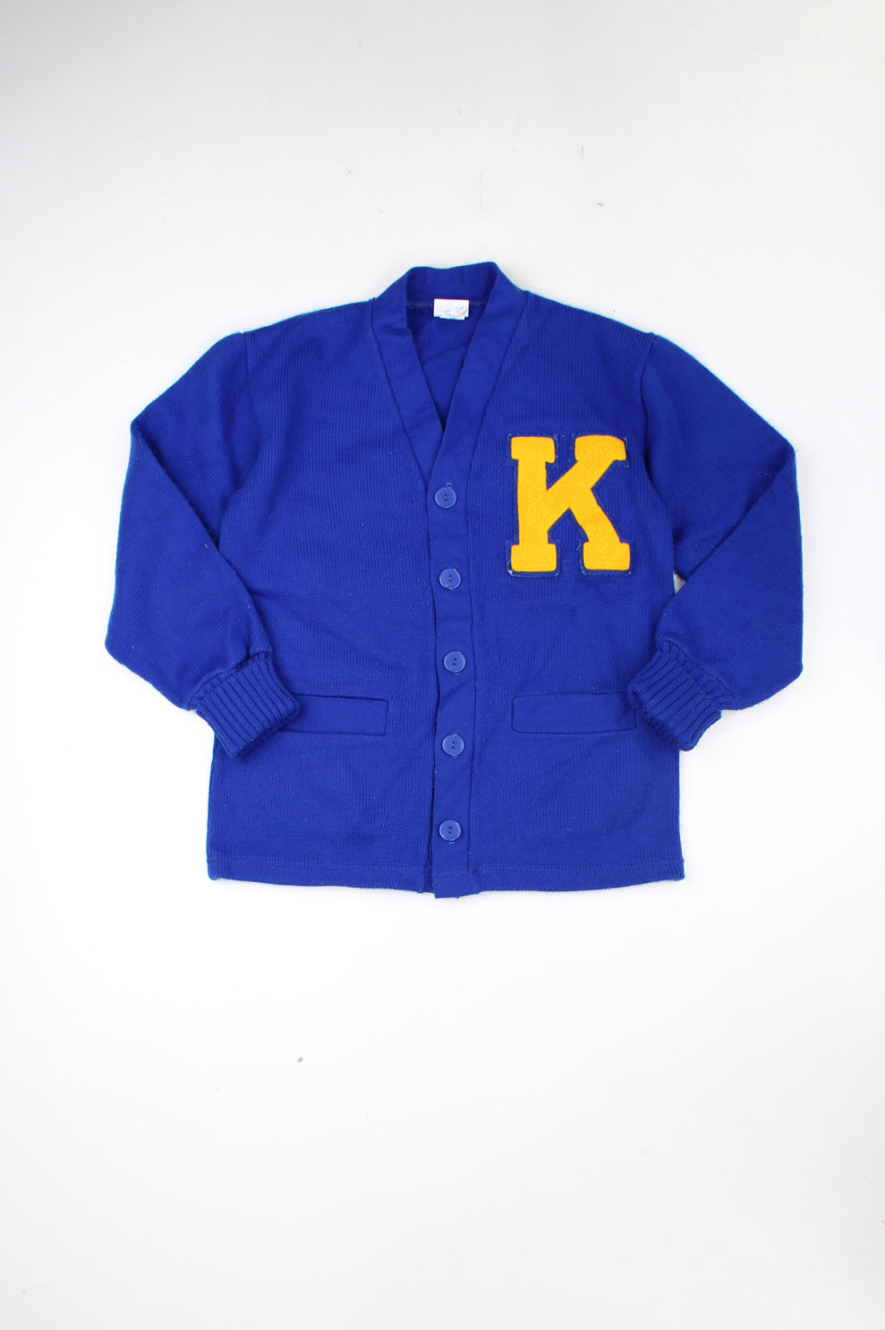 Vintage Hatchers made in the US 100% acrylic wool blue varsity/letterman cardigan, features embroidered badge and pockets 