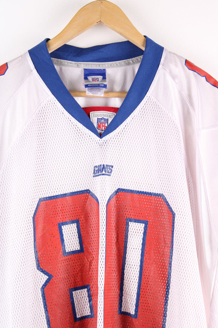 Vintage New York Giants NFL, Reebok jersey in the white, blue and orange team colourway, with Jeremy Shockey number 80 on the back. 