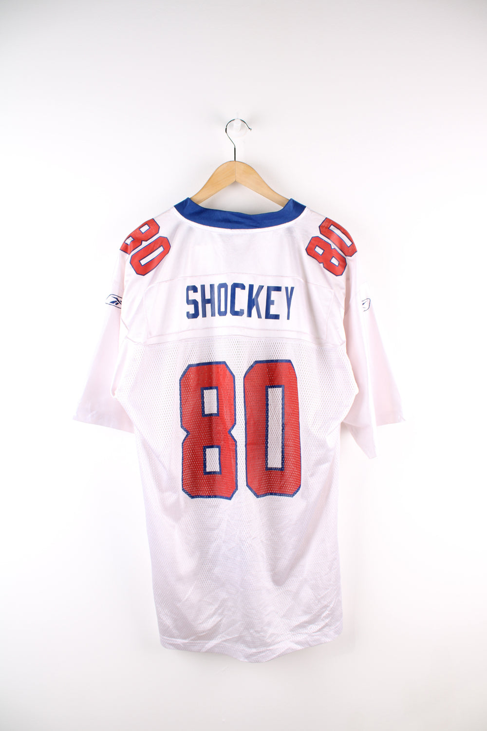 Vintage New York Giants NFL, Reebok jersey in the white, blue and orange team colourway, with Jeremy Shockey number 80 on the back. 