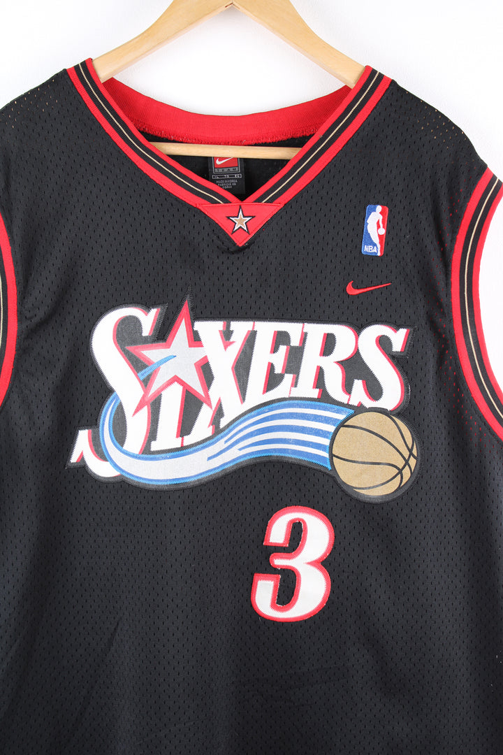 Vintage NBA Philadelphia 76ers, Nike jersey in the black and red team colourway, embroidered logos on the front and Allen Iverson number 3 on the back. 