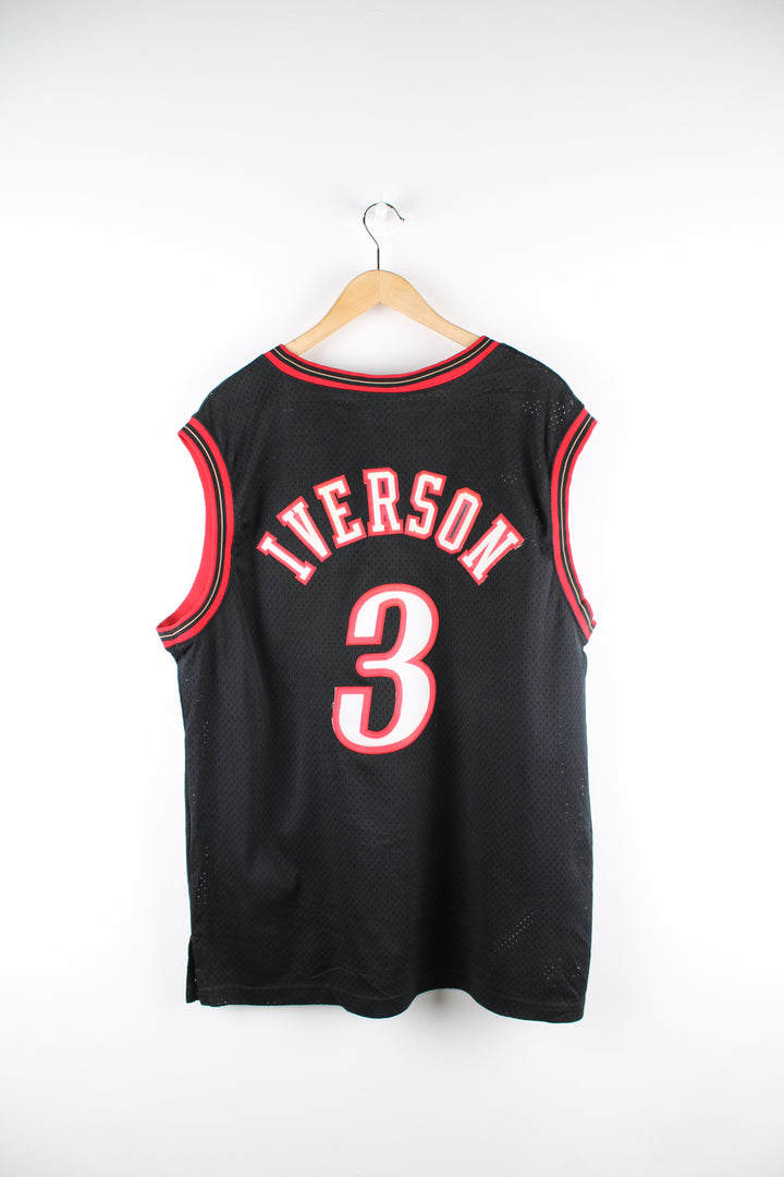 Vintage NBA Philadelphia 76ers, Nike jersey in the black and red team colourway, embroidered logos on the front and Allen Iverson number 3 on the back. 