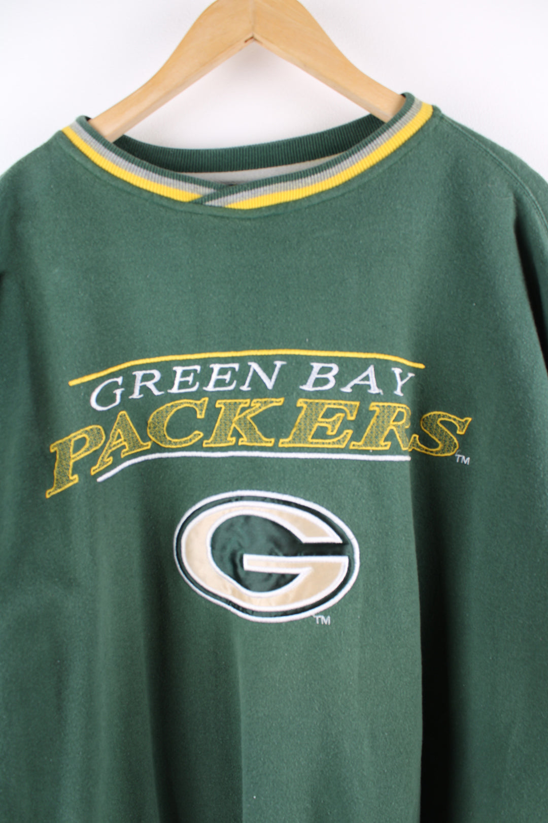 Vintage Green Bay Packers NFL, Starter sweatshirt in the green and yellow team colourway, embroidered spell out and logo across the front. 