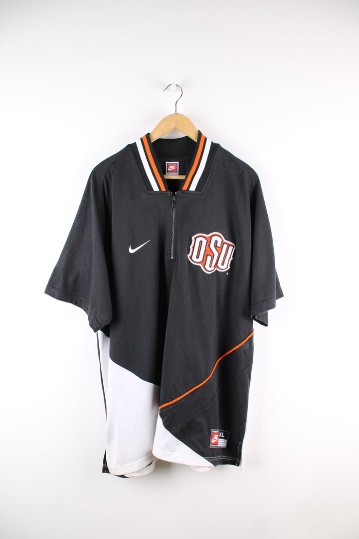 Vintage Ohio State University, Nike training top in the black, orange and white team colourway, quarter zip up with embroidered logos on the front.