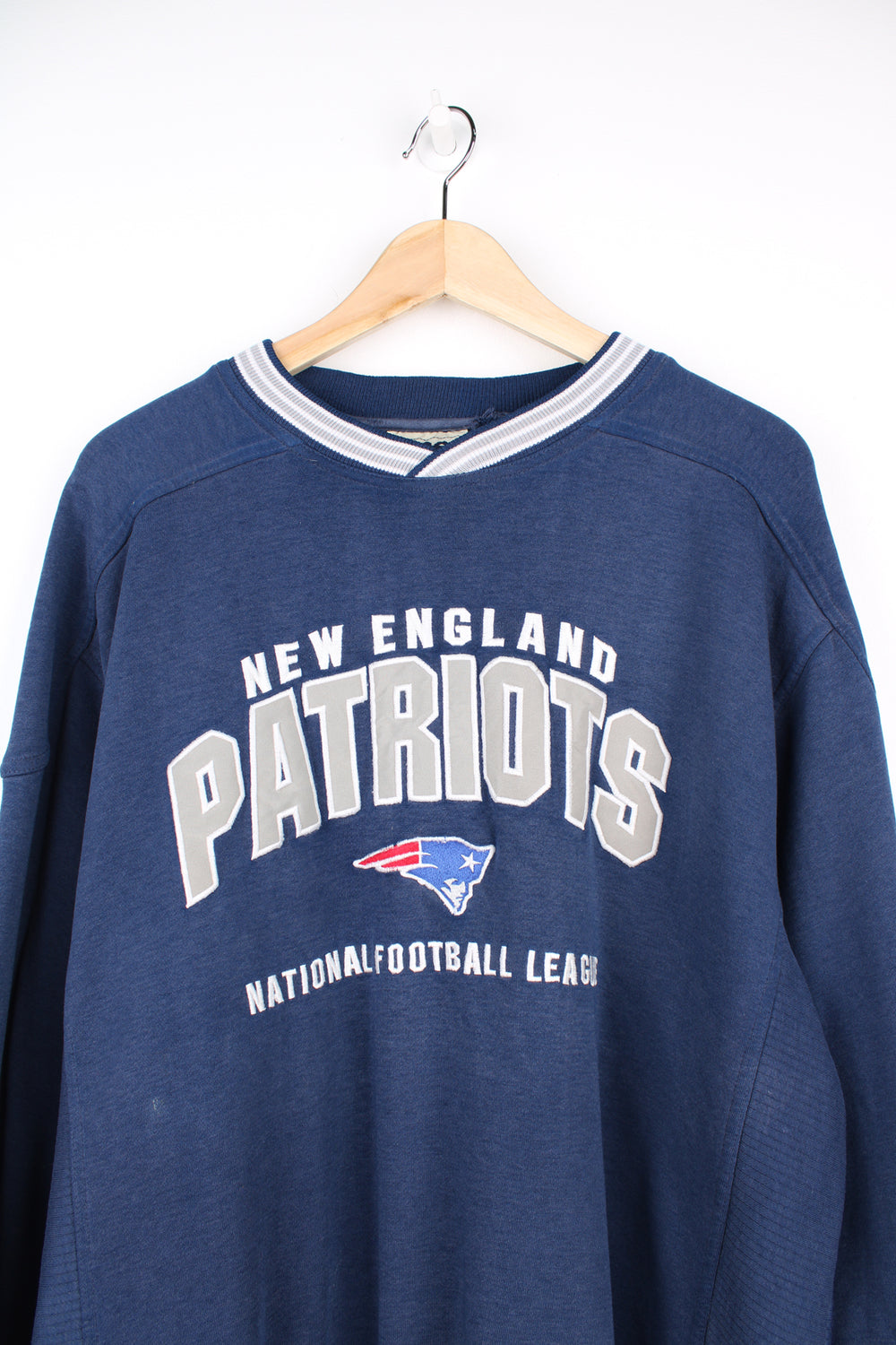 Vintage New England Patriots sweatshirt with embroidered team logo on the front. Made by Lee Sport. good condition - some small paint marks on the sleeve and front (see photos) Size in Label:  Mens XL