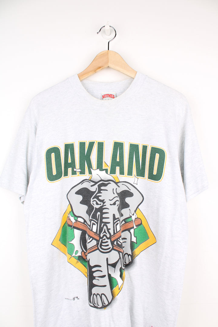 Vintage 90's Oakland Athletics As grey single stitch t-shirt. Features printed elephant graphic on the front and back. Made by Nutmeg. good condition - two faint marks on the front (see photos) Size in Label:  Mens M